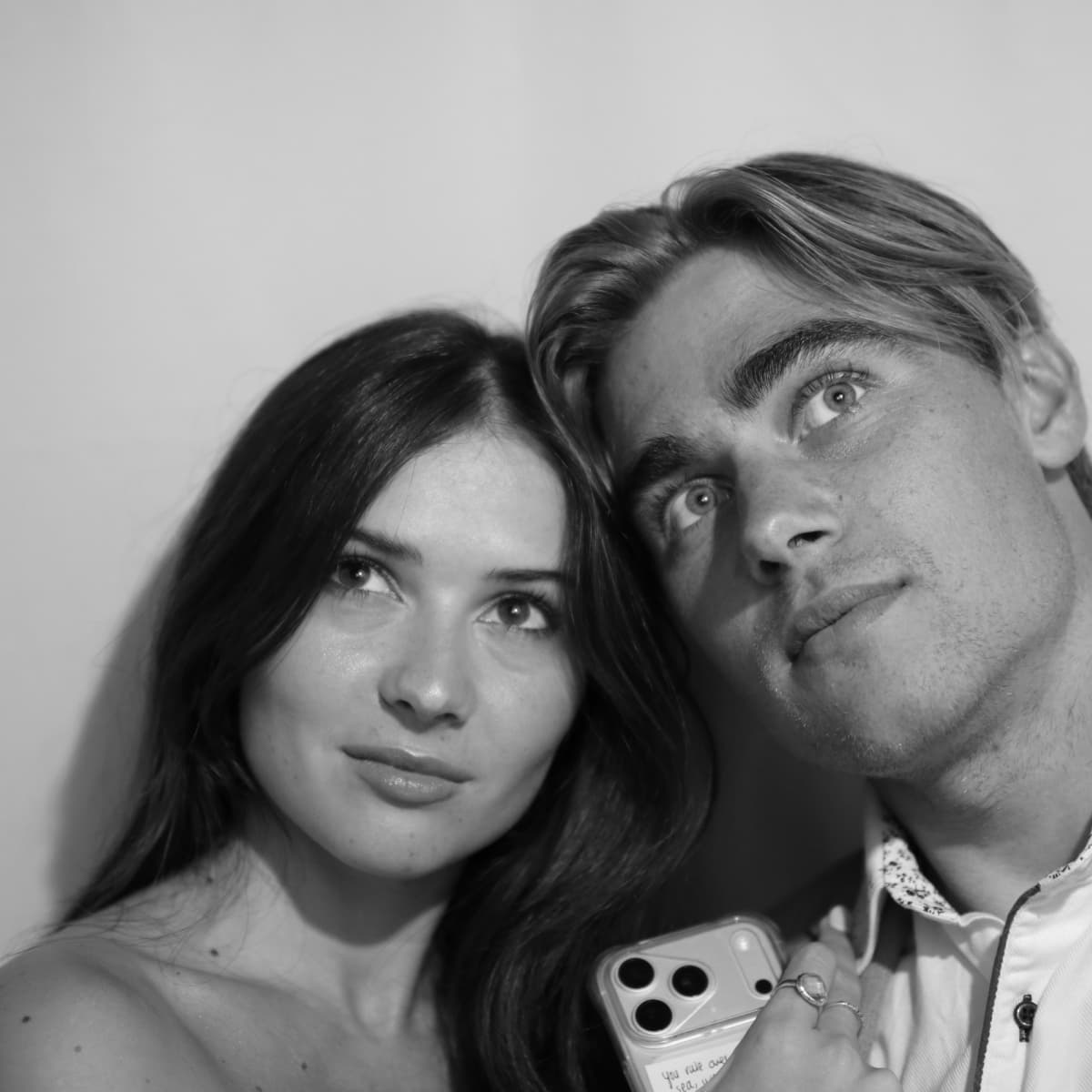 Friends posing with props in photo booth Cape Town